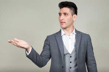 Portrait of young multi ethnic businessman in suit