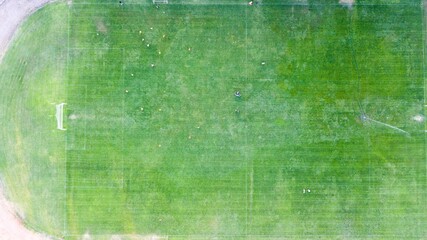 Aerial view of the amateur football player green pitch