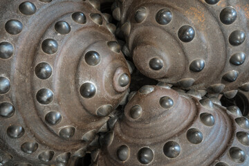 Tungsten steel inserts of a mining borehead.