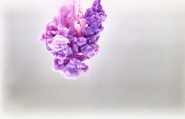Violet pastel ink smoke cloud in water