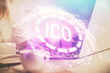 Double exposure of woman hands typing on computer and crypto market theme hologram drawing. Blockchain concept.