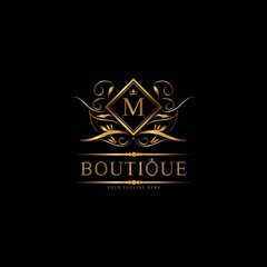 Vintage monograms M letter. Golden heraldic letter logos