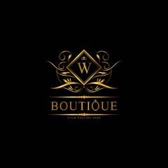 Fototapeta premium Vintage monograms W letter. Golden heraldic letter logos