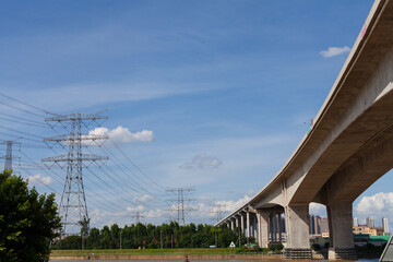 Fototapeta na wymiar Highway bridge under blue sky, transport concept.