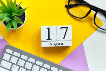 17th august - seventeenth day month calendar concept on wooden blocks.