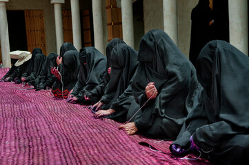 Women make palm wickets to sit on or cover the ceiling
