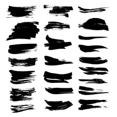 Textured dry black paint strokes set isolated on white backckground