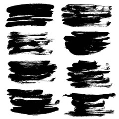 Thick black  textured smears set isolated on a white background