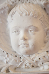 Obraz premium Child's Face Statue