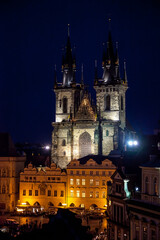 Fototapeta na wymiar Prague Tyn Cathedral in evening over the rooftops