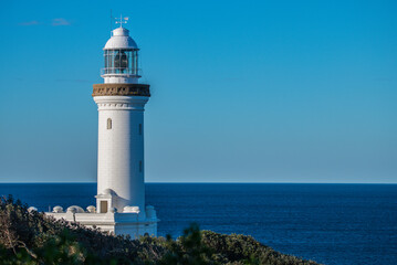 Fototapeta na wymiar Norah Head Lighthouse with a clear blue sky