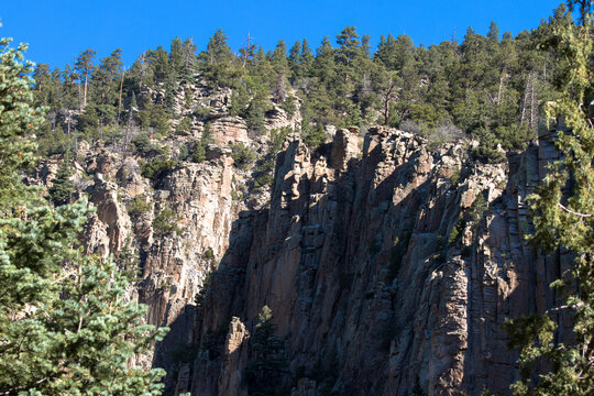 Steep cliffs called the Pallisades Sill in Cimarron Canyon State Park in New Mexico