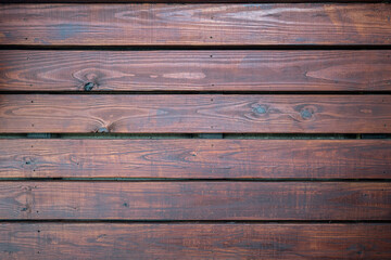 Fototapeta premium Zdjęcie bejcowanych drewnianych listew na betonie