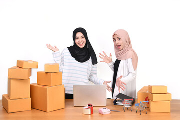 Sme business concept. women people are packing their packages.Delivery business Small and Medium Enterprise (SMEs). Beautiful women are delighted in success.