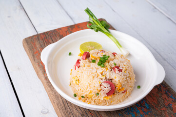 Asian Fried Jasmin rice with sausage and eggs.
