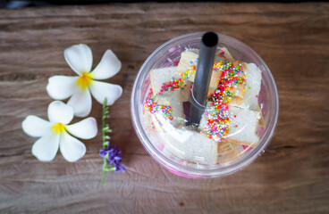 Smoothie yogurt milk in glass on wood table top view drink for fresh healthy 