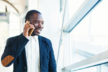 African American man talking on phone