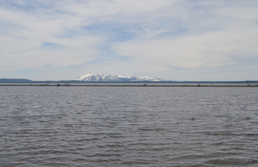 Late Spring in Yellowstone National Park: Looking Out From the Lagoon Near Hard Road to Travel Picnic Area Across Yellowstone Lake to Mount Sheridan of the Red Mountains
