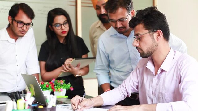 Indian team working together in office