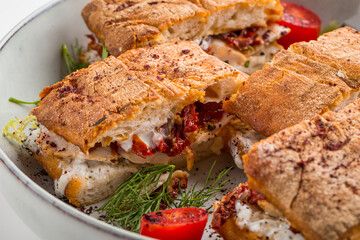 Gourmet festive sandwiches with sundried tomatoes