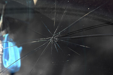Terrible dangerous car after a fatal accident. Broken windshield. A broken car with broken glass....