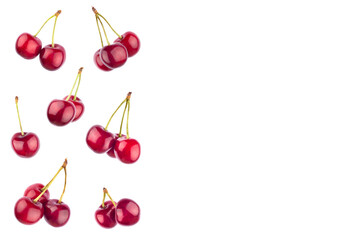 Set of ripe red sweet cherries isolated on white.