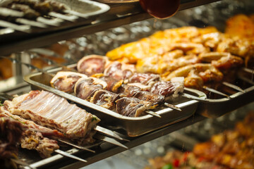 Selective focus on prepared raw skewers shashlyq