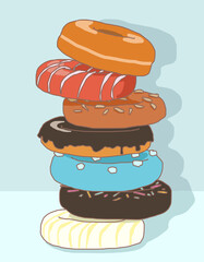 various colorful donuts being piled up