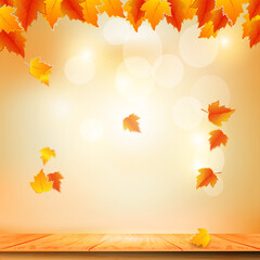Naklejka na ściany i meble Bokeh lights and autumn leaves falling on the table.