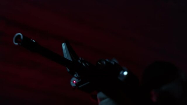 gun in hand. ready to soot
