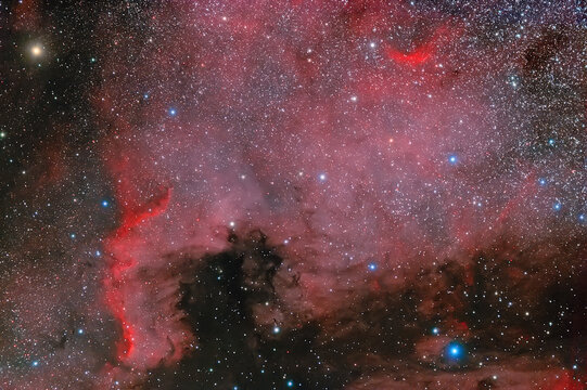 A photograph of outer space taken through an amateur telescope. Nebula North America. Hydrogen nebula and stars.