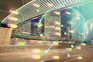 Map and data theme hologram on city view with skyscrapers background double exposure. International technology in business concept.