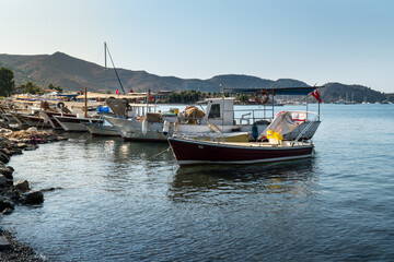 Fototapeta na wymiar Selimiye village and Selimiye bay on Bozburun peninsula near Marmaris resort town in Mugla province on the south west coast of Turkey. Fishing and small pleasure boats