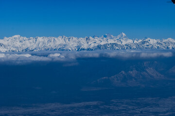 Fototapeta na wymiar A beautiful view of Snow Covered mountains at Kashmir Valley,India.
