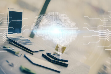 Double exposure of desktop with computer and brain drawing hologram. Artificial intelligence concept.