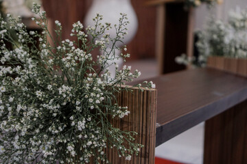 white colors floral wedding in indoor elegant beautiful concept decoration