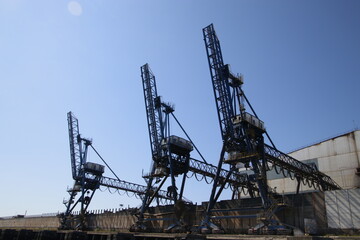 Fototapeta na wymiar Cranes in the harbor of Bilbao
