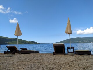 lounge chairs on the beach