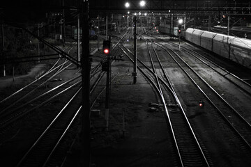 photo railwais tracks with wagons night