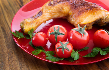Roasted chicken legs with vegetables