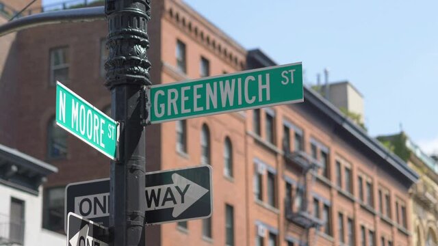 Greenwich and N Moore Street Sign In New York City in 4K Slow motion 60fps