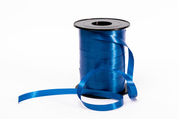coil of blue ribbon for decoration isolated on white background