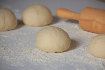 Fototapeta na wymiar Dough on the white bread in the kitchen