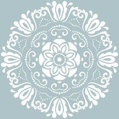 Oriental vector pattern with arabesques and floral elements. Traditional classic round white ornament. Vintage pattern with arabesques