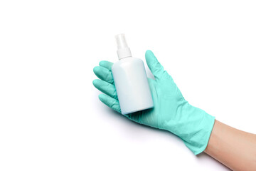 Female hand in latex rubber glove and hand sanitizer spray dispenser isolated on white background with clipping path