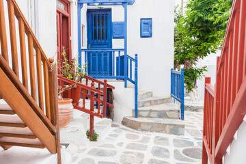Greece travel cityscape, traditional greek house with flowers in Mykonos island, Cyclades