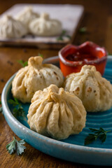 Homemade dumplings with pepper and herbs