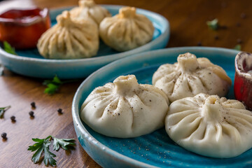 Homemade dumplings with pepper and herbs