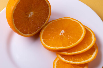 sliced citruses on white 
