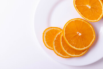 sliced citruses on white 